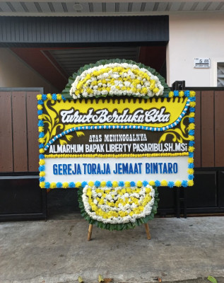 Papan Bunga Duka di Kebun Bunga